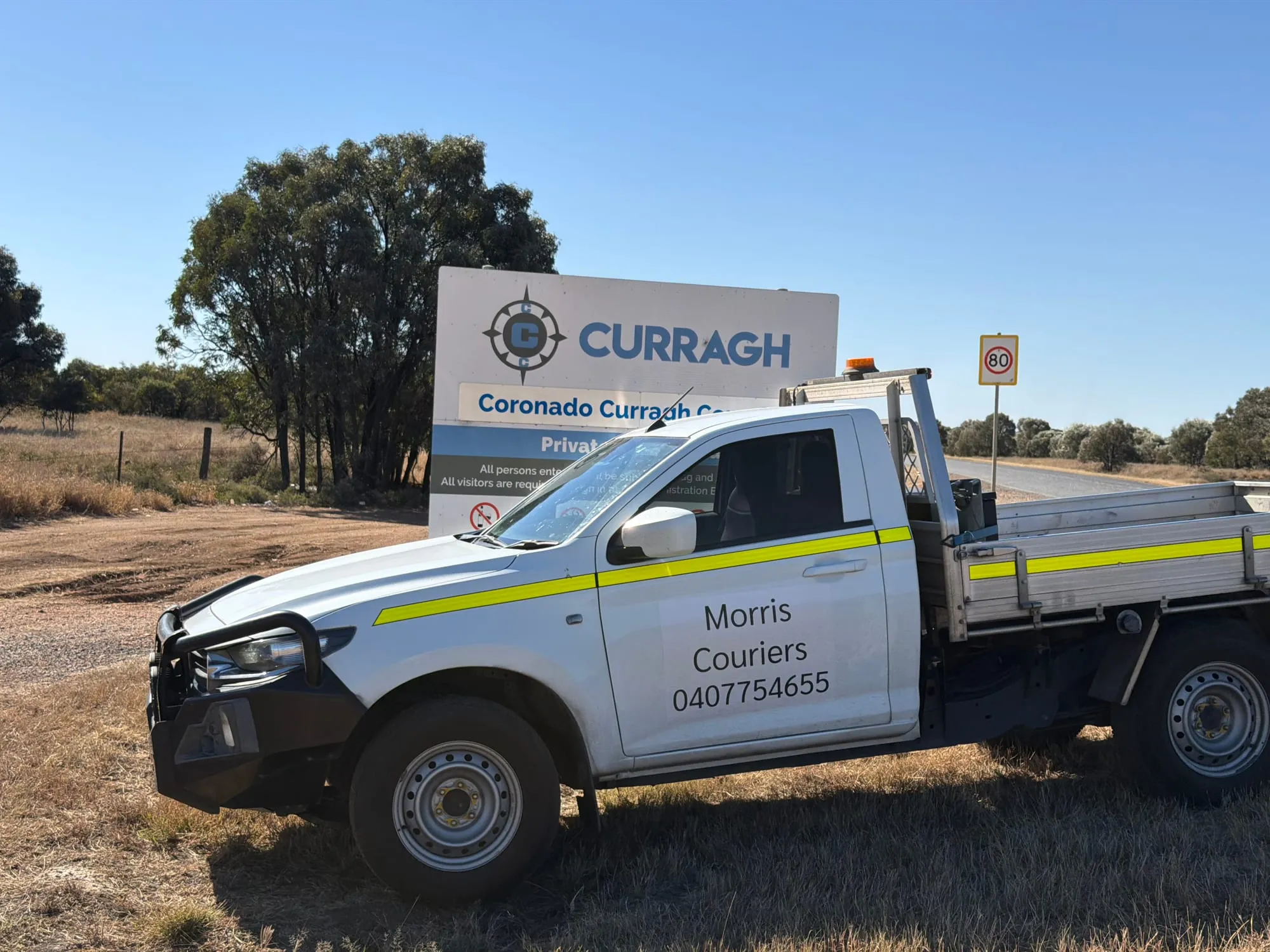 A Morris Couriers ute at the entrance to Curragh mine, west of Rockhampton.
