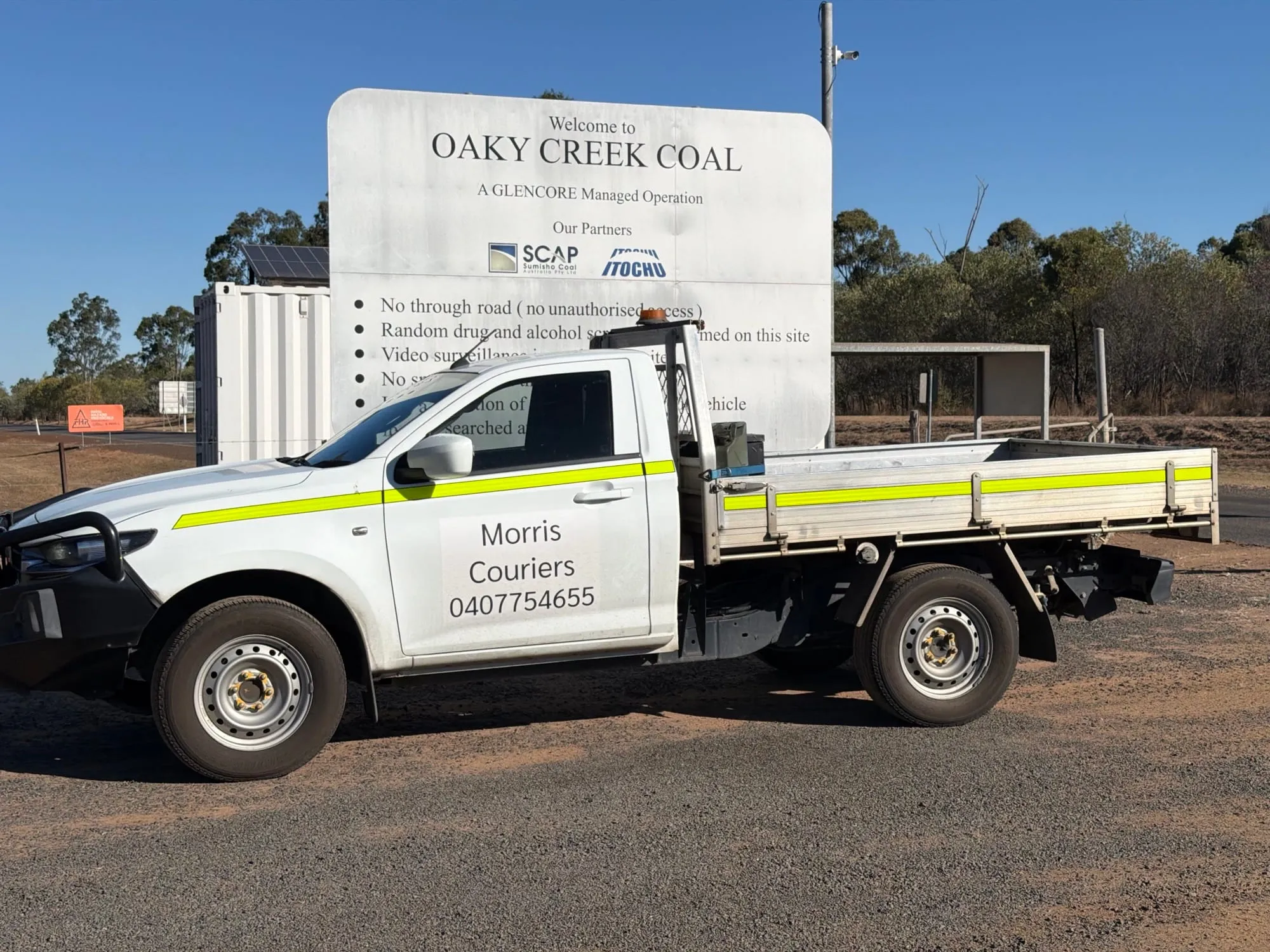 The Morris Couriers ute parked at a coalfields access road west of the coast.